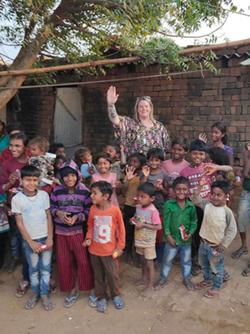Chris and kids at a village where we deliver BFP food kits